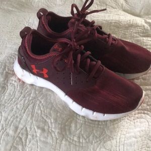 Maroon and orange Under Armour shoes